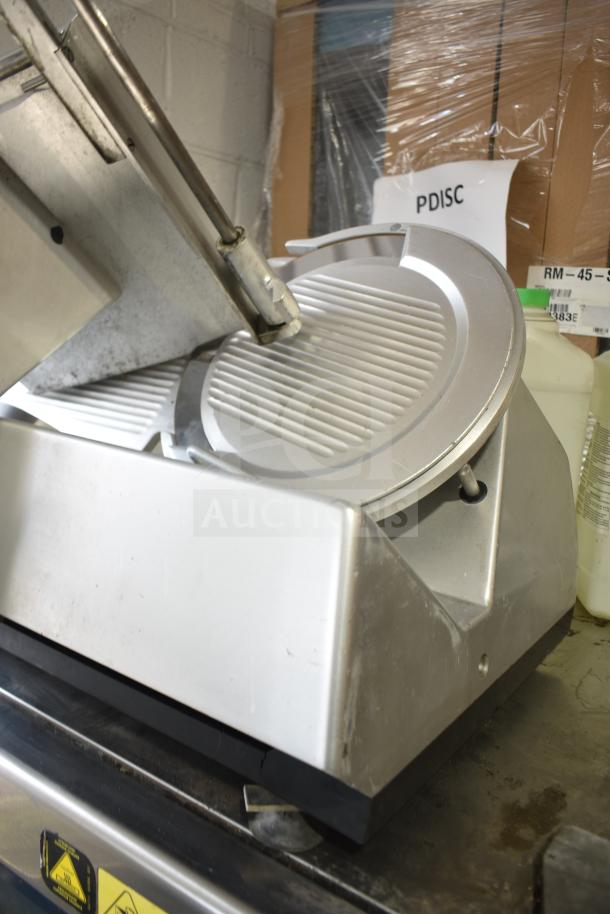 Bizerba SE12D commercial meat slicer, 120 volts, 1 phase, used condition, visible blade and controls, durable metal build.