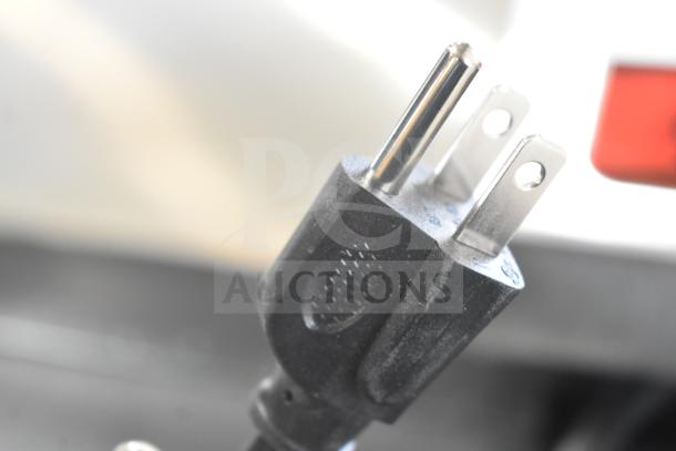 Close-up of a power plug for the Avantco 177IC1800 countertop induction range, 120 volts, 1 phase.