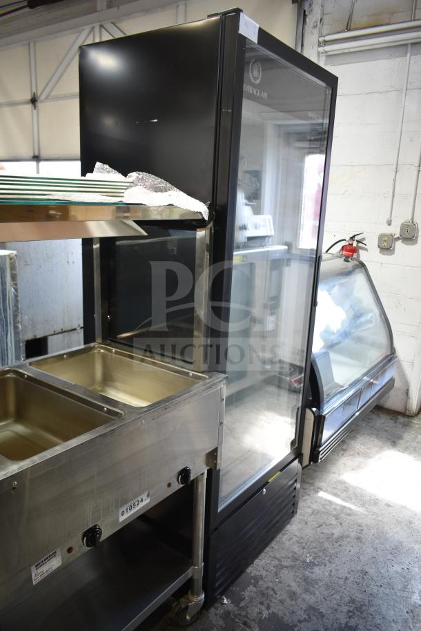 Beverage Air MT23-1 B glass door merchandiser, black, LED lighting, new condition with minor scratches, 115V, one-phase.