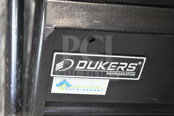 Dukers DSM-68SR commercial 3-door cooler label showcasing brand and use of natural refrigerant.