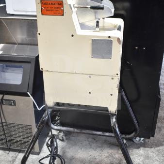 Pasta Mat commercial pasta machine on casters, 208 volts, cream color, metal parts, visible label with manufacturer's details.