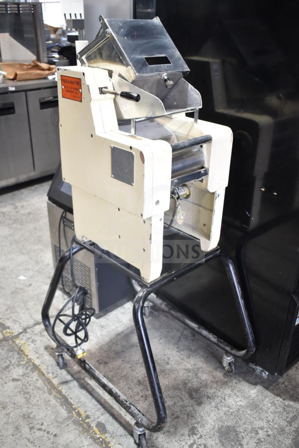 Pasta Mat commercial pasta machine with metal body, on casters, 208 volts, used condition. Model tag visible on side.