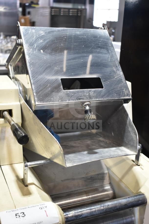 Pasta Mat commercial floor pasta machine on casters, stainless steel, 208V, used condition, adjustable settings.