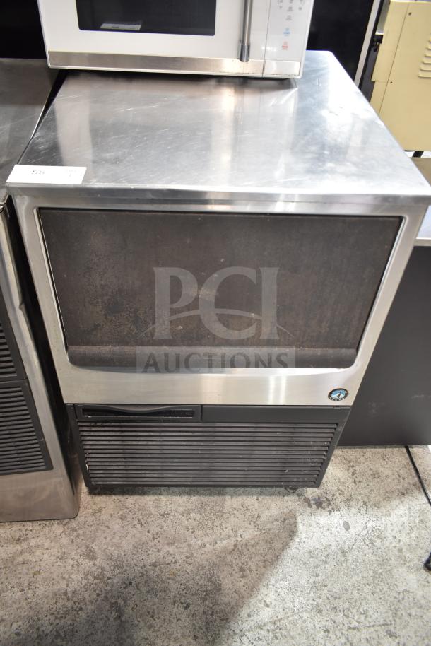 Hoshizaki KM-160BWJ undercounter ice machine, stainless steel, 115 volts, used condition, visible Hoshizaki logo.