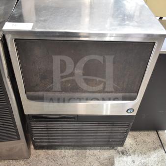 Hoshizaki KM-160BWJ undercounter ice machine, stainless steel, 115 volts, used condition, visible Hoshizaki logo.