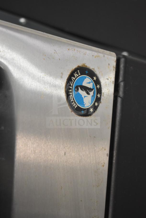Hoshizaki KM-160BWJ Ice Machine with logo; stainless steel, slight wear; 115 Volts, 1 Phase.