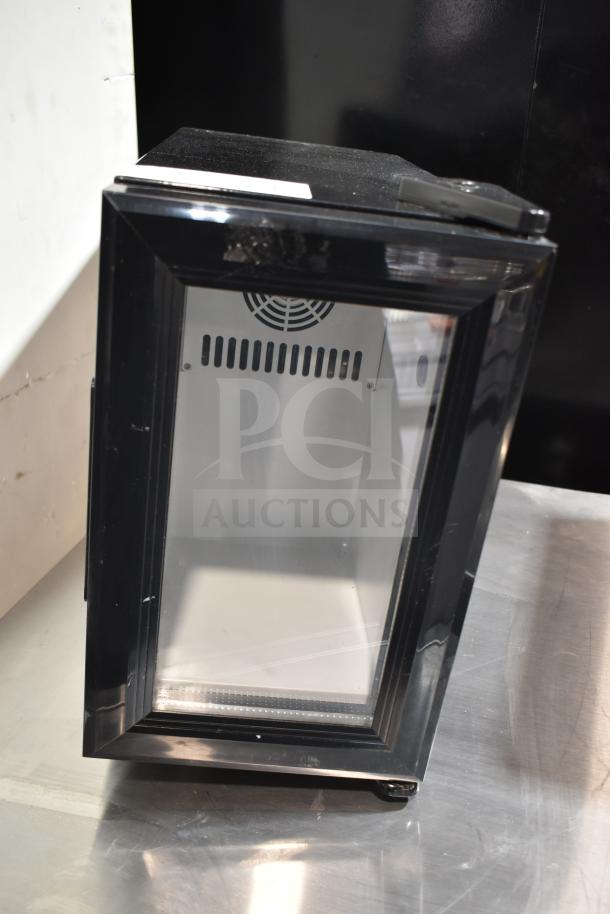 SC08 Mini Cooler Merchandiser, 110/120 Volts, 1 Phase, model SC08. Glass front, black exterior, good condition.