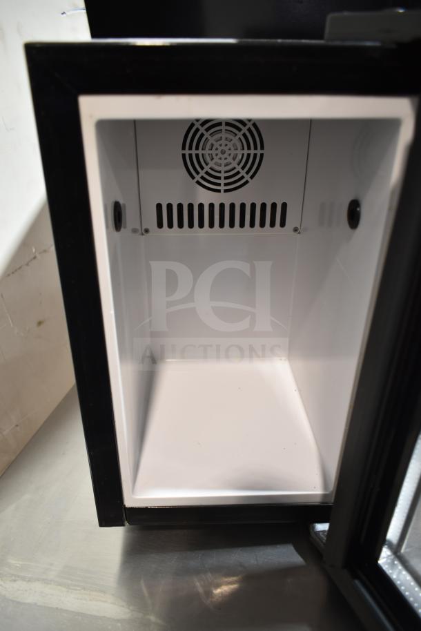 SC08 Mini Cooler Merchandiser, model SC08. Features 110/120 volts, 1 phase, black exterior, glass door, interior fan.