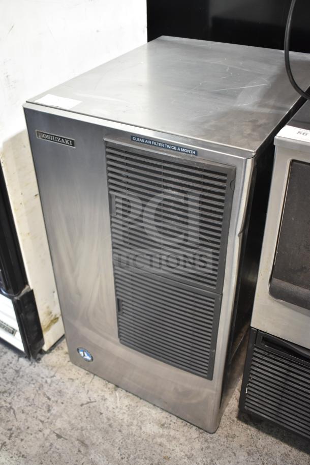Hoshizaki KM-650MAH ice machine head, stainless steel exterior, 208-230V, 1 phase, clean air filter label visible.