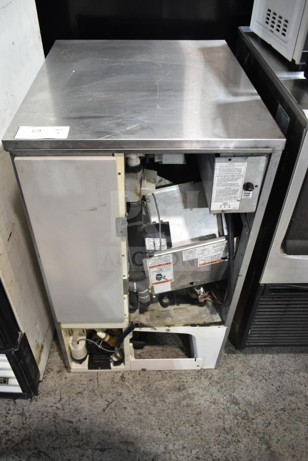 Hoshizaki KM-650MAH commercial crescent cuber ice machine head, 208-230 volts, 1 phase, visible internal components, used condition.