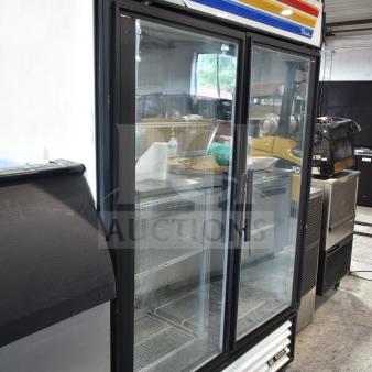 True GDM-49F commercial 2-door reach-in freezer merchandiser, with glass doors, 115/208-230 volts, 1 phase, good condition.