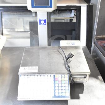 Mettler Toledo bPro commercial countertop food portioning scale, 100 volts, 1 phase, keypad, digital display, in good condition.