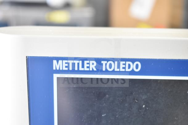 Mettler Toledo bPro commercial countertop food portioning scale, 100 volts, 1 phase, in good condition with visible branding.