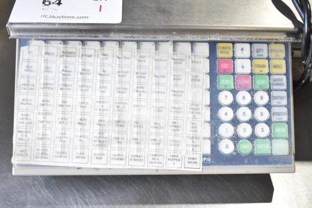 Mettler Toledo bPro commercial countertop food portioning scale, 100 volts, 1 phase, with labeled keypad, used condition.