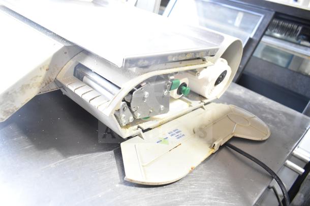 Mettler Toledo bPro countertop food scale, 100V, 1 phase, visible wear and markings, ideal for commercial use.