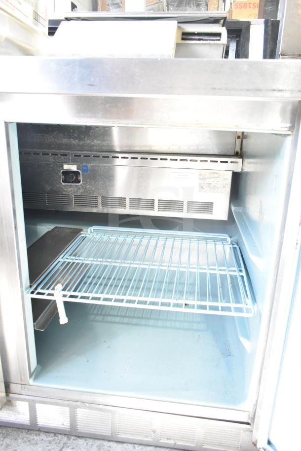Delfield 4448 Commercial 2 Door Undercounter Cooler in stainless steel. Interior shelves, 115 volts, 1 phase. Clean condition.