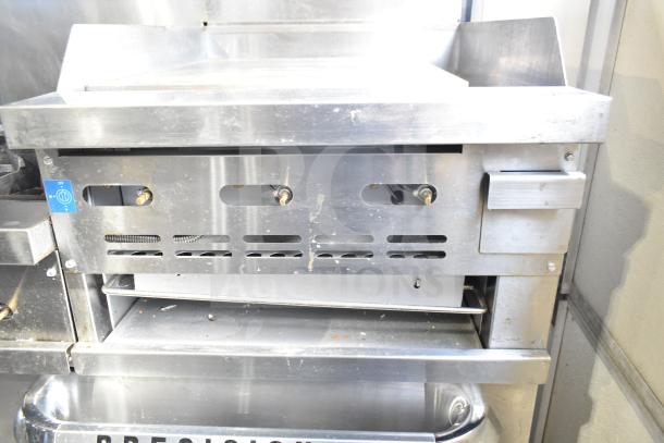 Precision RGR60-GS24-P gas range with 6 burners, flat top griddle, 2 ovens, overshelf, backsplash, on casters. 278,000 BTU.