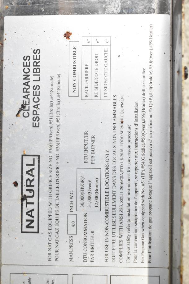 Precision RGR60-GS24-P commercial gas range tag showing clearance and BTU specifications.
