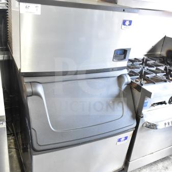 Manitowoc ID0303W-161D commercial ice head on bin, 115V, 1-phase, stainless steel, clean condition, logo visible.