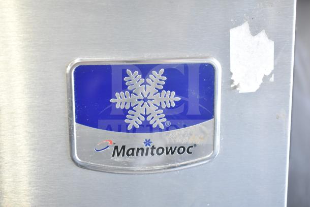 Manitowoc ID0303W-161D commercial ice machine logo with snowflake design on metal surface.