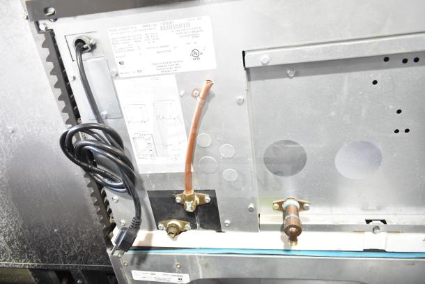 Manitowoc ID0303W-161D commercial ice head on bin, 115V, 1 phase, displays electrical and plumbing connections.