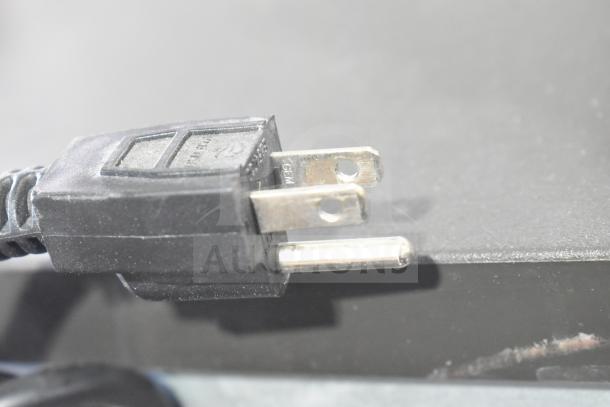 Power plug for Manitowoc ID0303W-161D Commercial Ice Machine, 115V, 1 Phase, partially visible.