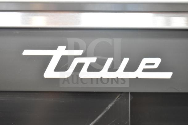 True logo detail on the 2019 TSD-33G-HC-LD Commercial 2 Door Reach In Cooler Merchandiser.