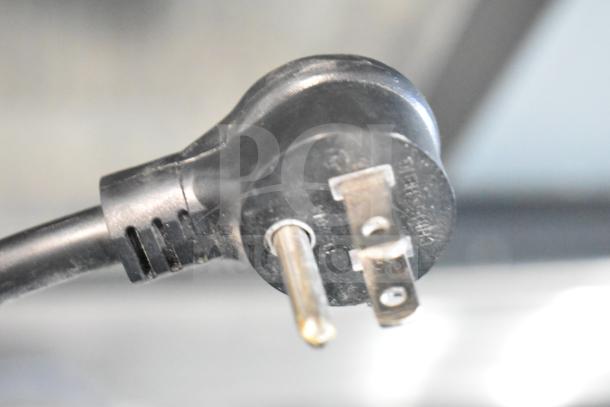 Close-up of power plug for 2019 True TSD-33G-HC-LD merchandiser, 115 volts, 1 phase.