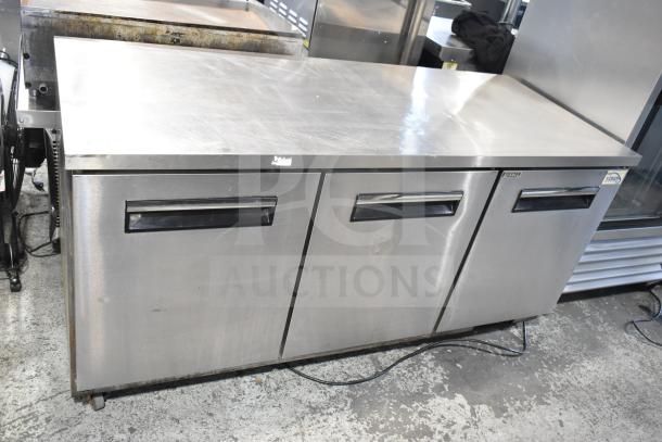 Yukon YUC-72F commercial undercounter freezer, 3 doors, stainless steel, 115V, 1 phase, good condition, visible wear.