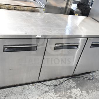 Yukon YUC-72F commercial undercounter freezer, 3 doors, stainless steel, 115V, 1 phase, good condition, visible wear.