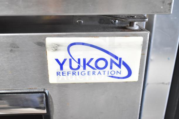 Yukon YUC-72F commercial undercounter freezer, 3-door, 115V, branded label on metal surface.
