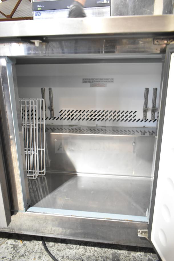 Yukon YUC-72F Commercial 3 Door Undercounter Freezer, stainless steel, 115V, 1 Phase, model YUC-72F, shown open.