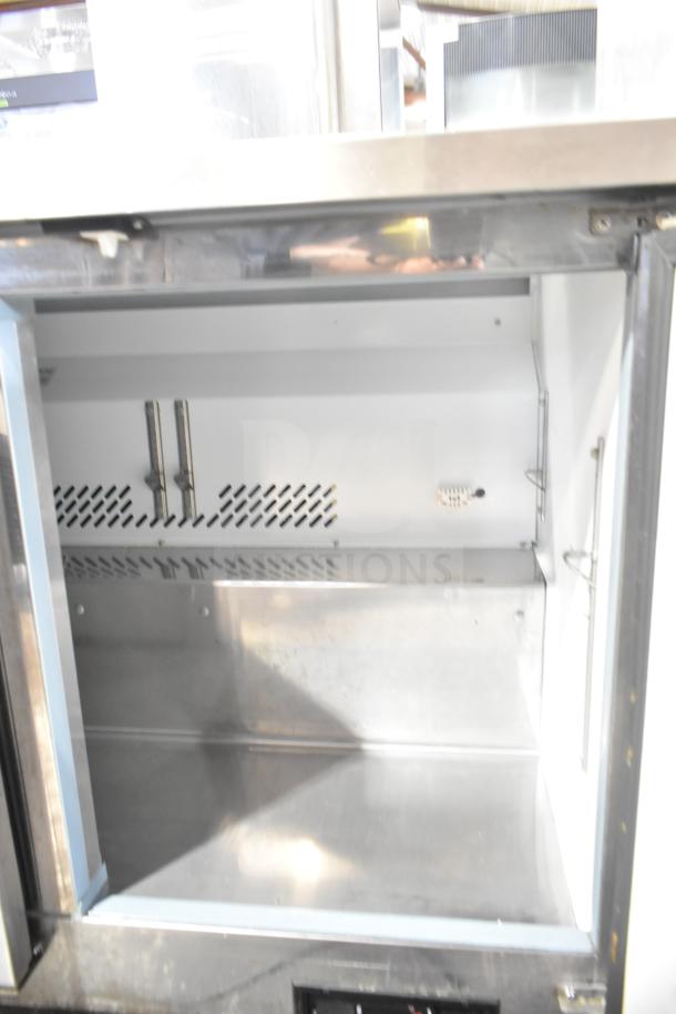 Yukon YUC-72F commercial undercounter freezer, 3 doors, stainless steel, 115V, 1 Phase, interior view, excellent condition.