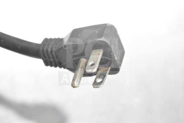 A close-up of a power plug for a Yukon YUC-72F commercial freezer, showing 115 volts, 1 phase compatibility.