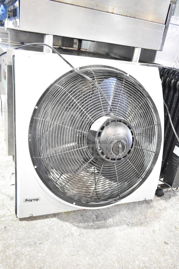 Air King 9166G fan with visible controls and label, paired with MainStays WSH07O2ABB radiator heater. Good condition.