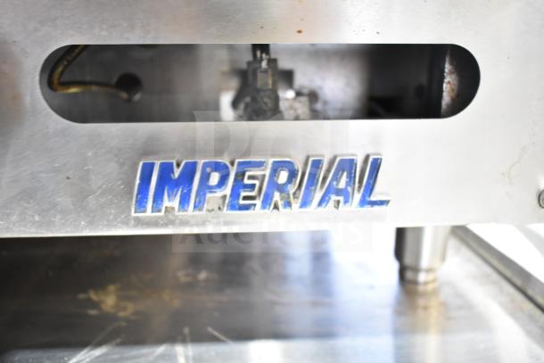 Imperial commercial countertop gas griddle, stainless steel, blue logo. Used condition, ideal for professional kitchens.