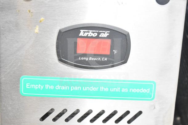 Turbo Air TCBE-36SDR-E-N6 chef base, digital display, reminder label to empty drain pan, stainless steel finish.