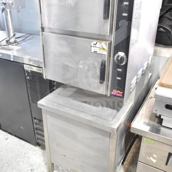 Groen HY 6E commercial electric 2-deck steam cabinet, 208V, 3-phase. Stainless steel, visible caution labels, clean condition.