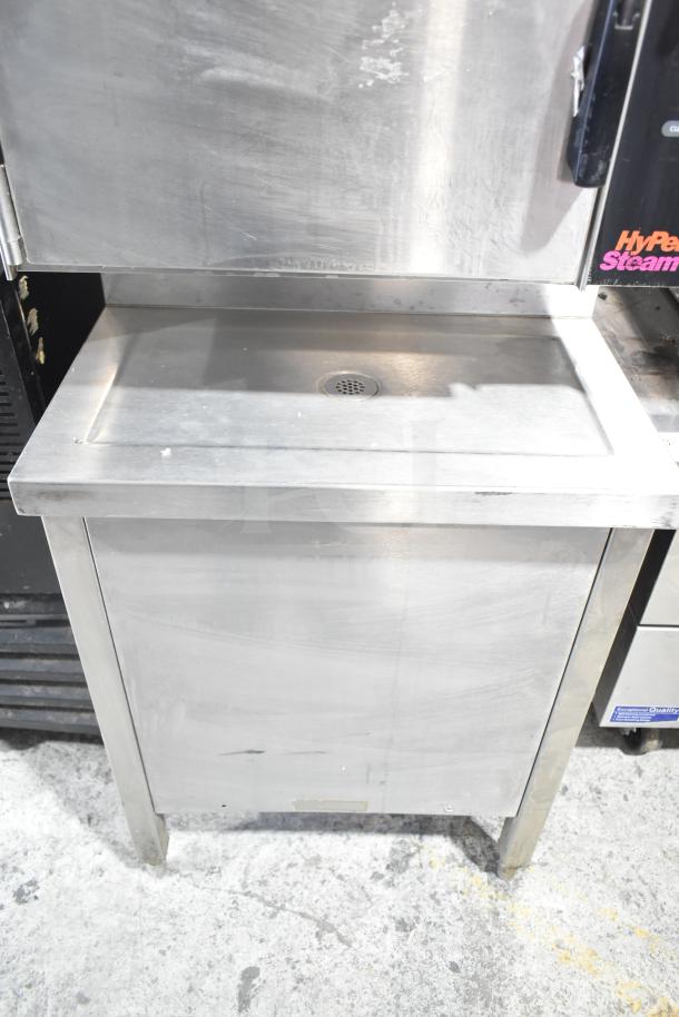 Groen HY 6E commercial steam cabinet, stainless steel, 2-deck, 208V, 3-phase, front view with drain.