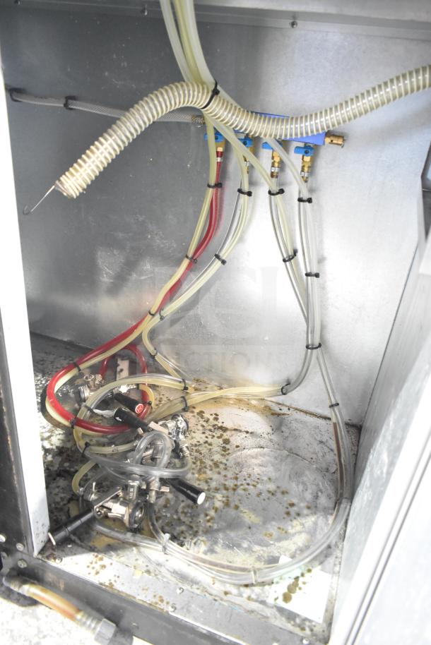 Beverage Air DD48HC-1-B-138 kegerator interior showing 4 tap hoses and connections, 115V, 1 Phase, good condition.
