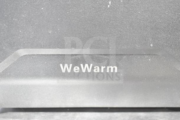 LifeSmart HT1013US 1500W Quartz Infrared Heater, 120V, black finish, "WeWarm" label visible.
