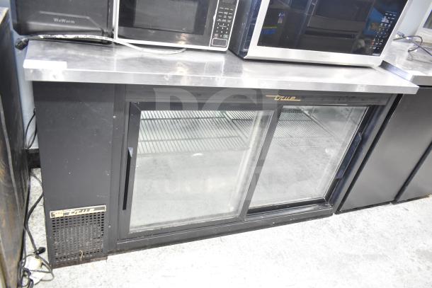 True TBB-24-60G-SD back bar cooler, glass doors, 115V, 1 phase; features stainless steel top and adjustable shelves.