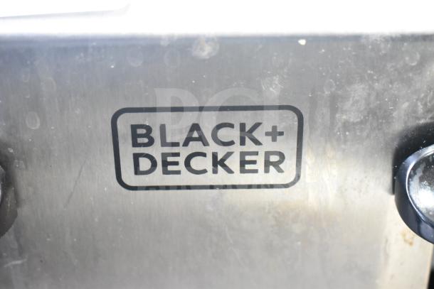 Black & Decker TR7847-18D 4-slot toaster, countertop model, 120V, 1 phase. Features branding on stainless steel body.
