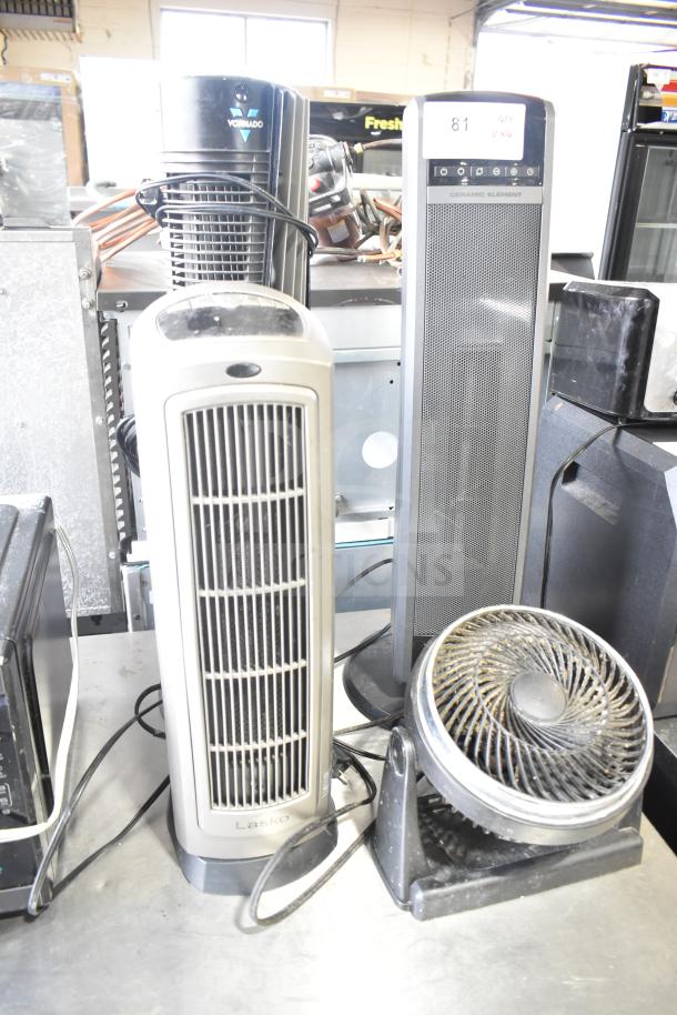 4 various appliances: Chung Yuan TF-810S table fan, Lasko CT30754 heater, Lasko 755320 heater, Vornado 143 tower fan.
