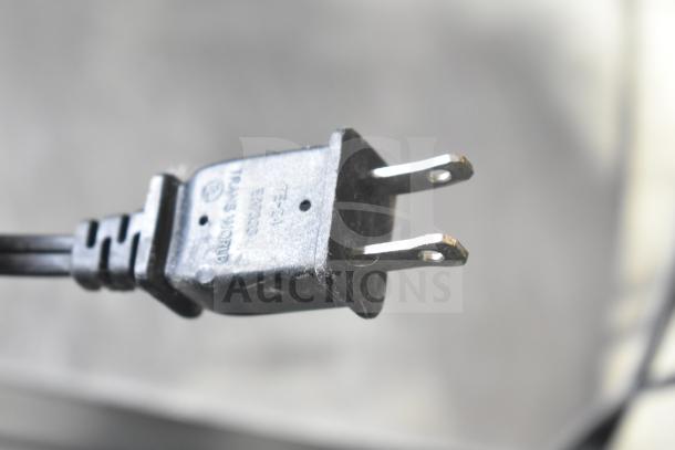 Power plug of Chung Yuan TF-810S 9" tabletop fan. Close-up view, labeled with model and Transworld branding.