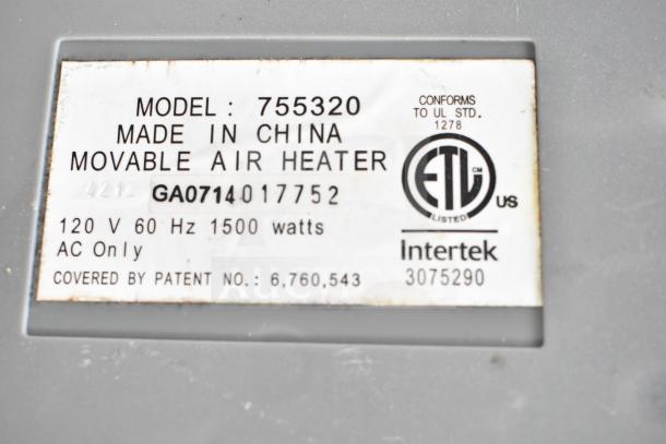Label detail of Lasko 755320 Heater, 120V, 1500W, AC only, Intertek certified, model and patent information visible.