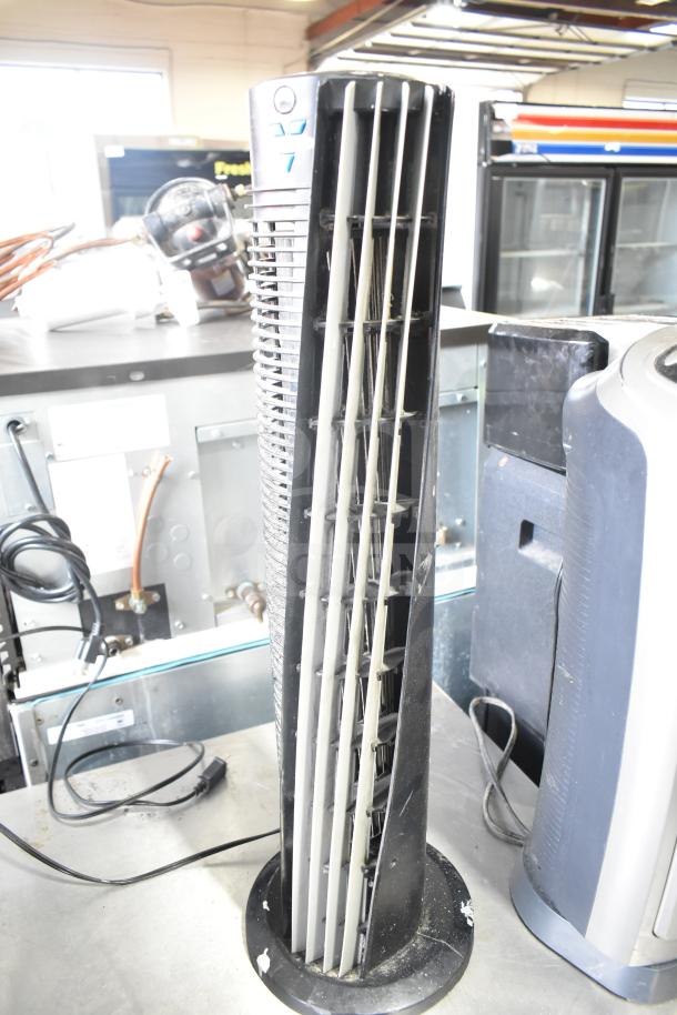4 various items including Chung Yuan TF-810S fan, Lasko CT30754 heater, Lasko 755320 heater, Vornado 143 tower fan.
