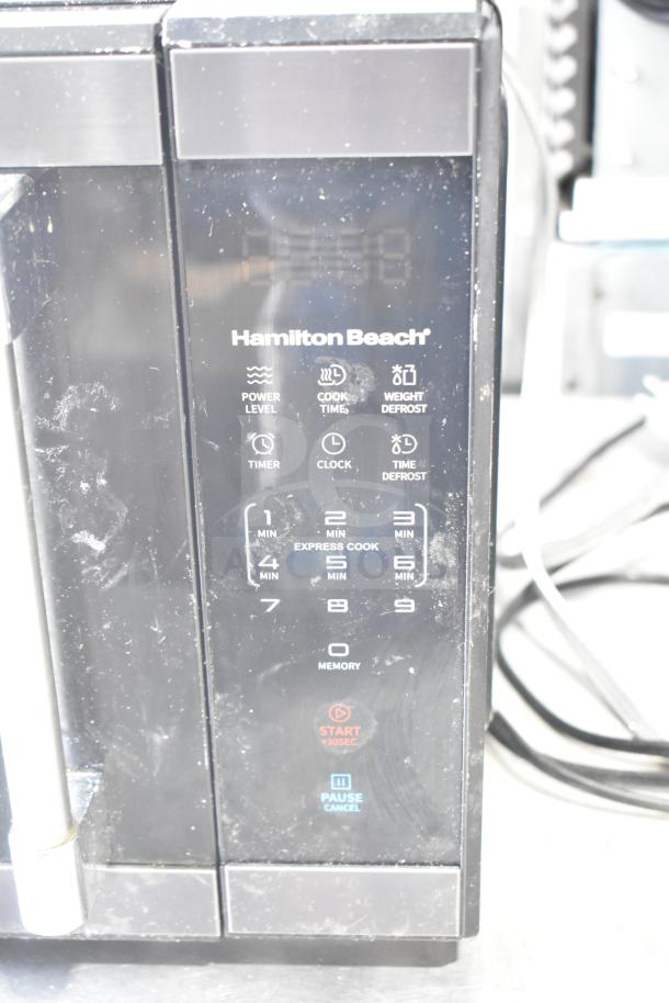 Hamilton Beach HB61B100027880 Countertop Microwave Oven, black, features digital touch controls, 120 volts, 1 phase.