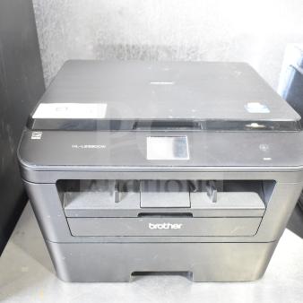 Brother HL-L2380DW printer, copier, and scanner on a countertop. Model number visible, in good condition.