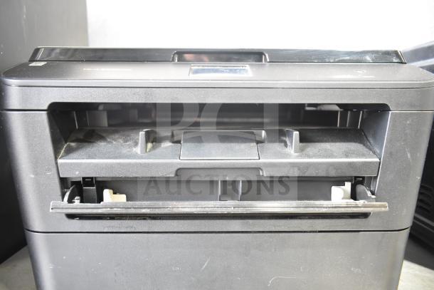 Brother HL-L2380DW printer with visible input tray, in used condition. Features copier and scanner functions.